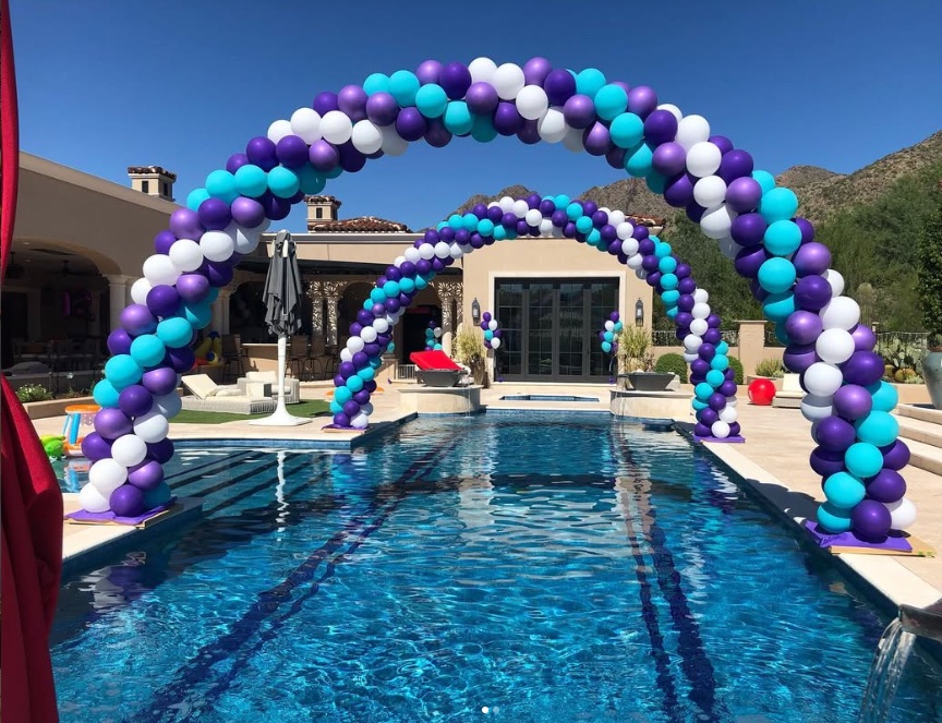 Purple and teal balloon arch by AZ Party Mart