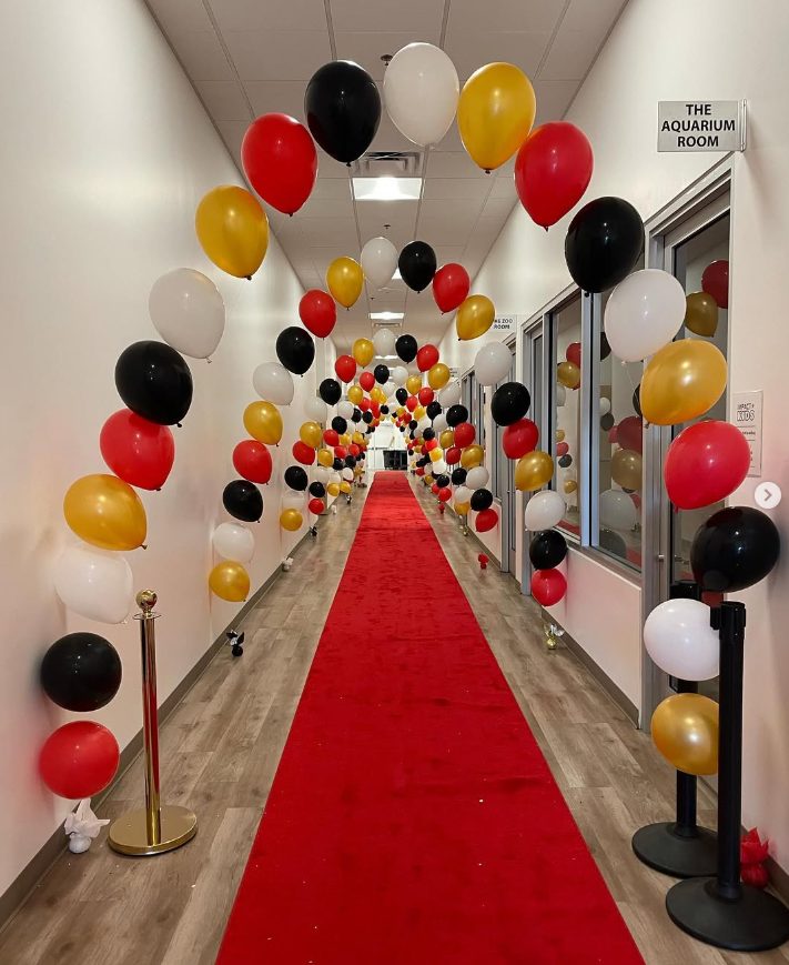 Balloon string arch by AZ Party Mart