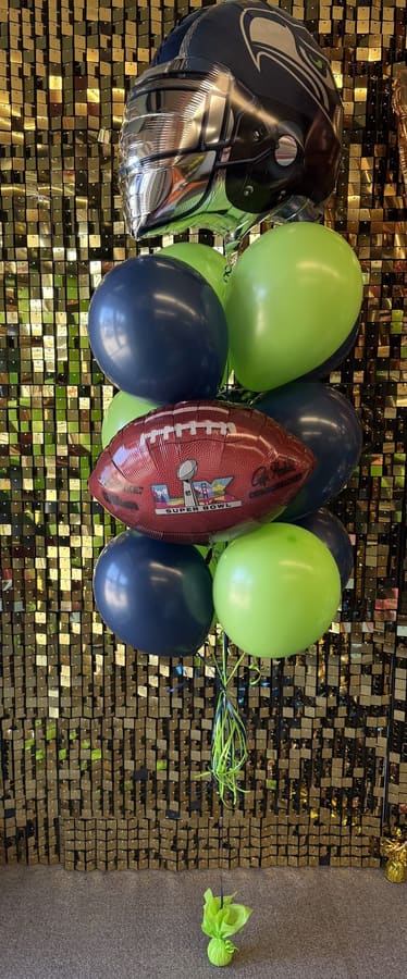 Football-themed balloon bouquet by AZ Party Mart