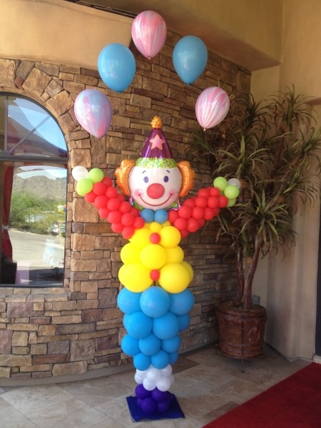 Clown balloon column with pastel balloons by AZ Party Mart
