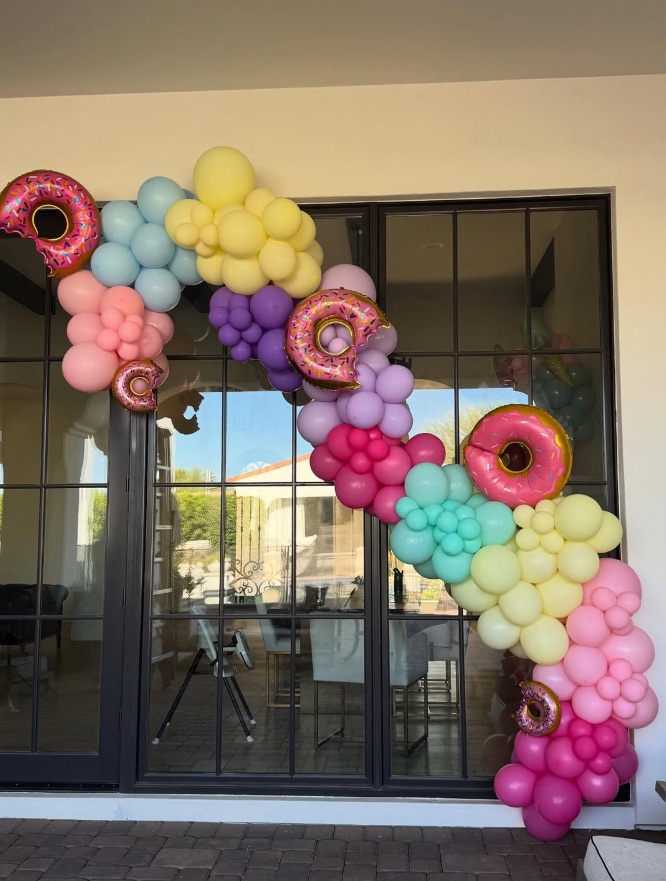 Organic balloon garland installation by AZ Party Mart