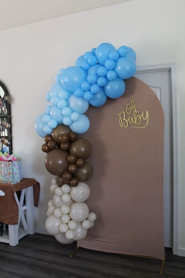 Organic balloon garland installation by AZ Party Mart