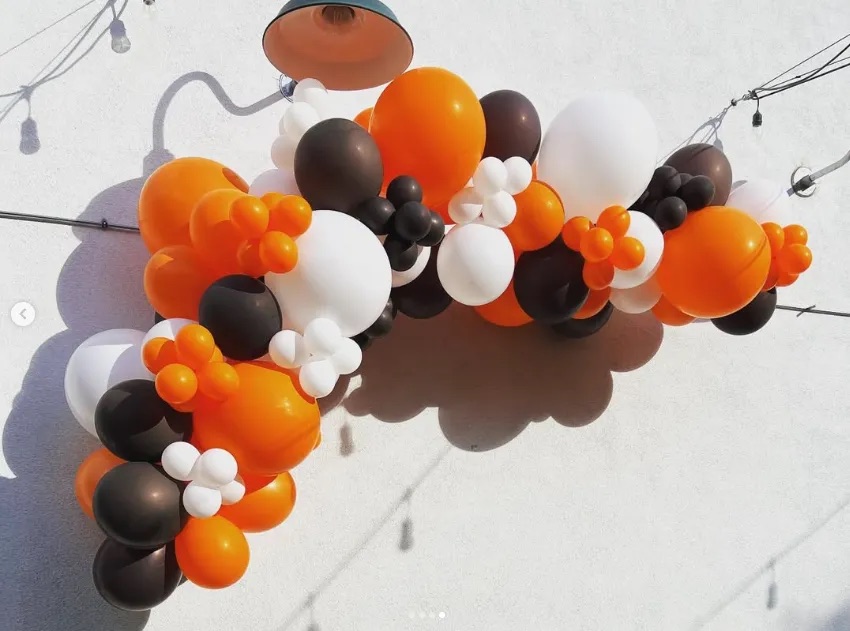 Organic balloon garland installation by AZ Party Mart