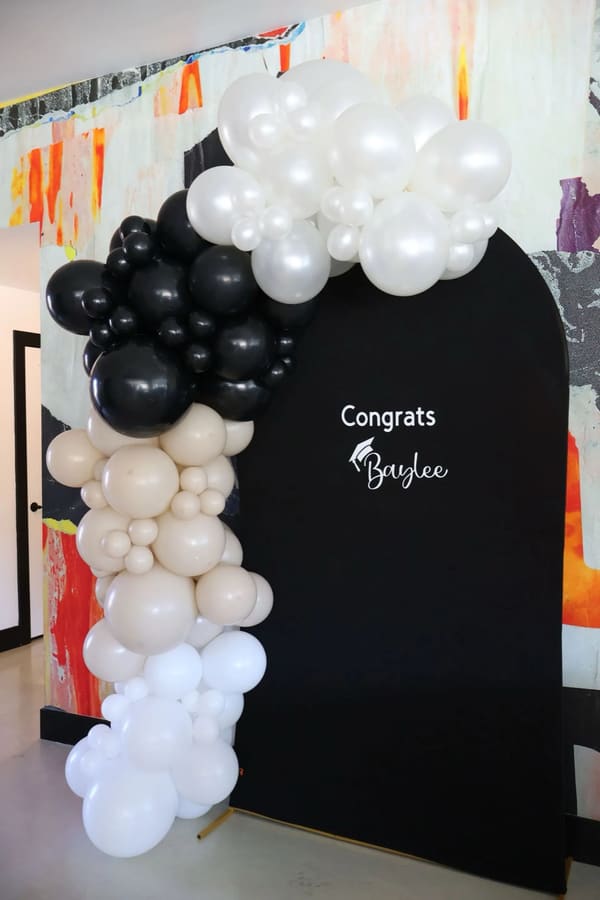 Organic balloon garland installation by AZ Party Mart
