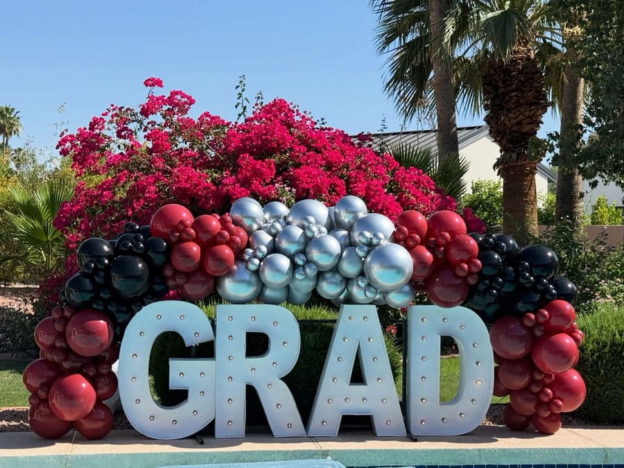Organic balloon garland installation by AZ Party Mart