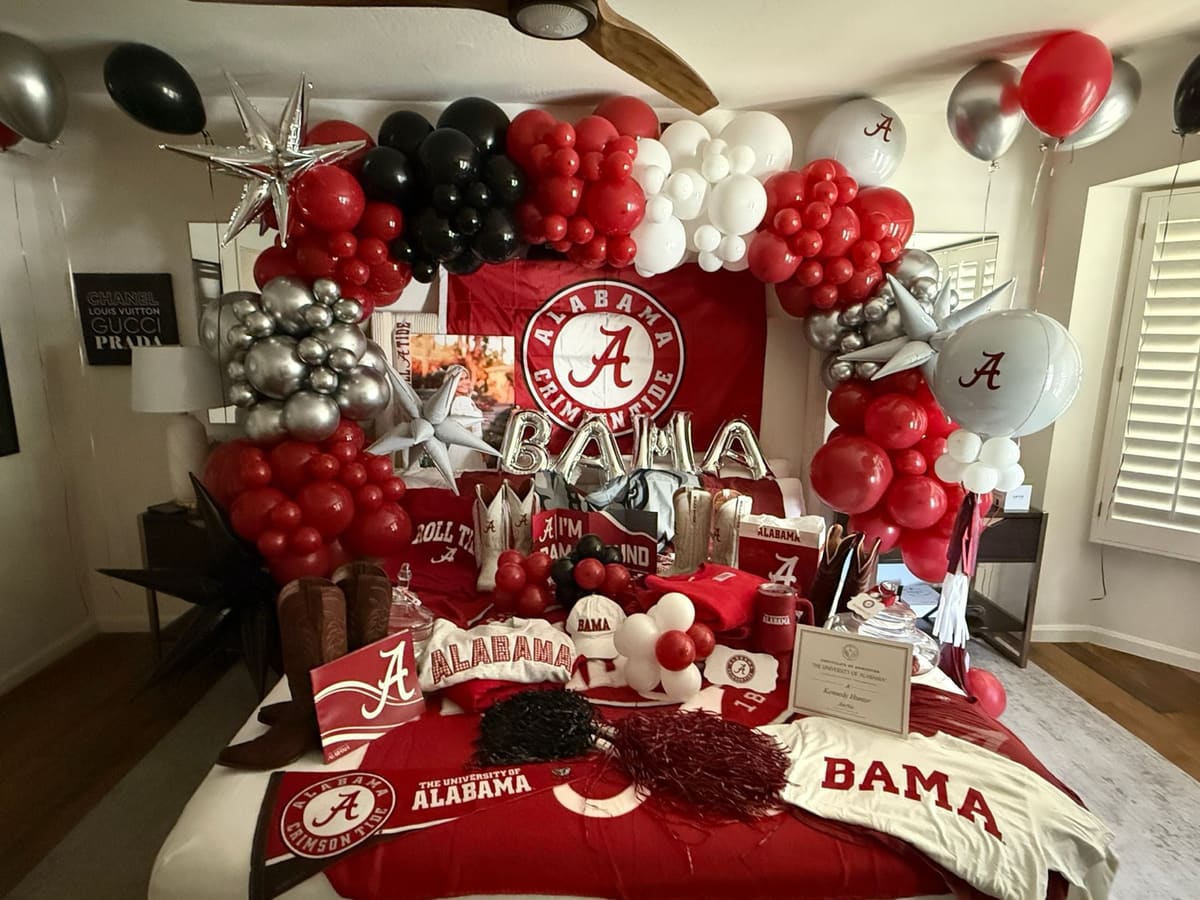 Crimson, black and silver balloon garland for an Alabama college signing celebration