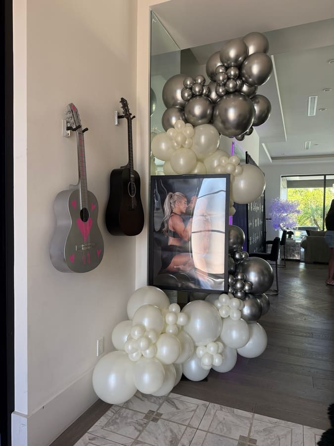 Organic balloon garland installation by AZ Party Mart