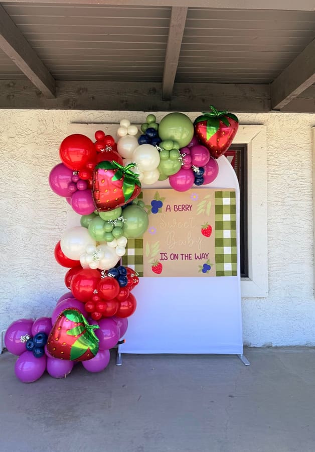 Organic balloon garland installation by AZ Party Mart