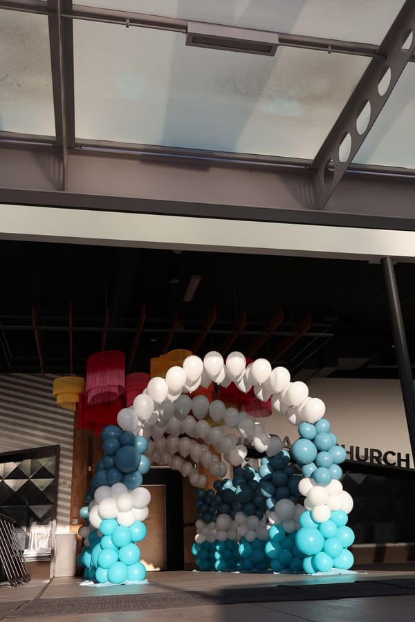 Teal and white organic balloon garland by AZ Party Mart