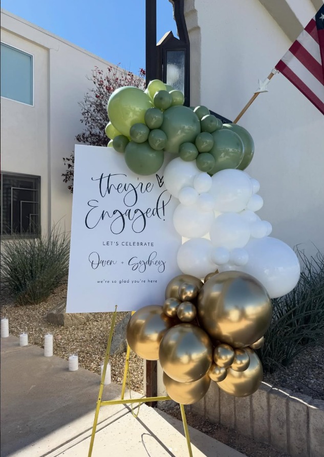 Engagement sign with gold, white and greenery balloons by AZ Party Mart