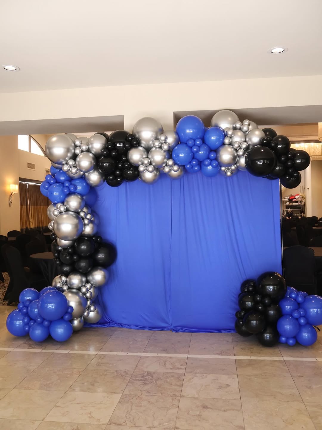 Organic balloon garland installation by AZ Party Mart